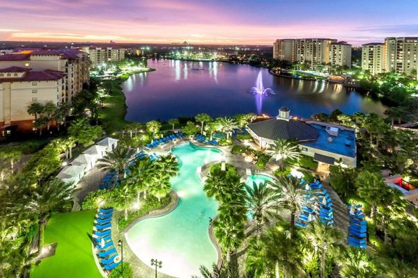 Wyndham Bonnet Creek in Orlando Fl view of pool in the evening overlooking the beauty of the lake 600