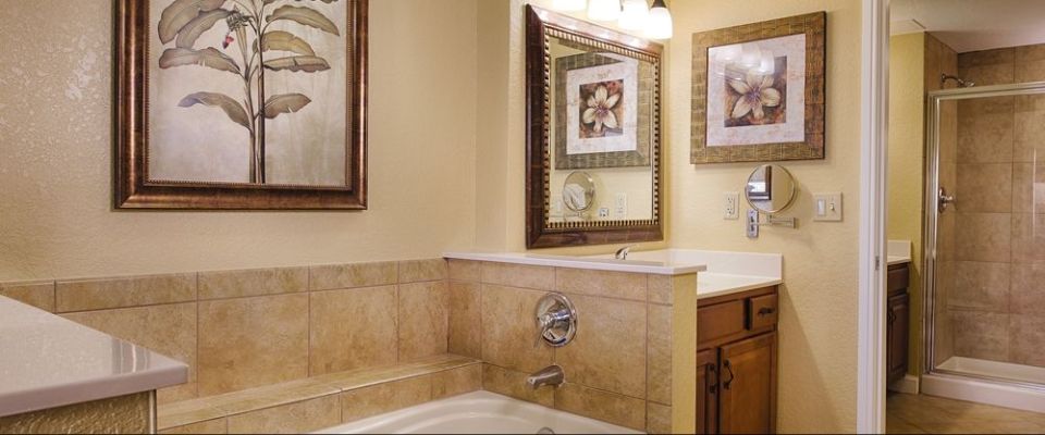Elegant Bathrooms with solid tops, whirlpool tubs and even a stand up shower unit at the Orlando Wyndham Bonnet Creek Resort